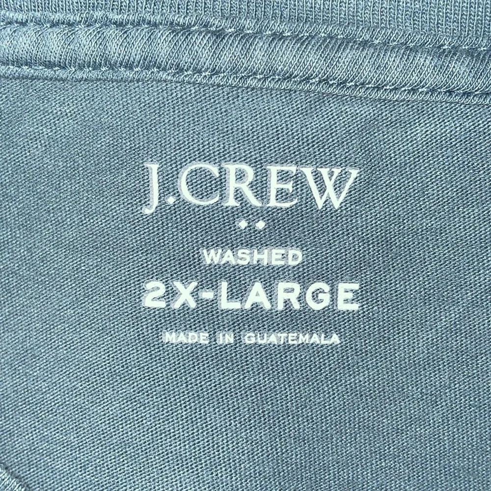J. Crew washed 100% cotton‎ men’s Size 2XL t-shirt. Color is a dark teal blue.